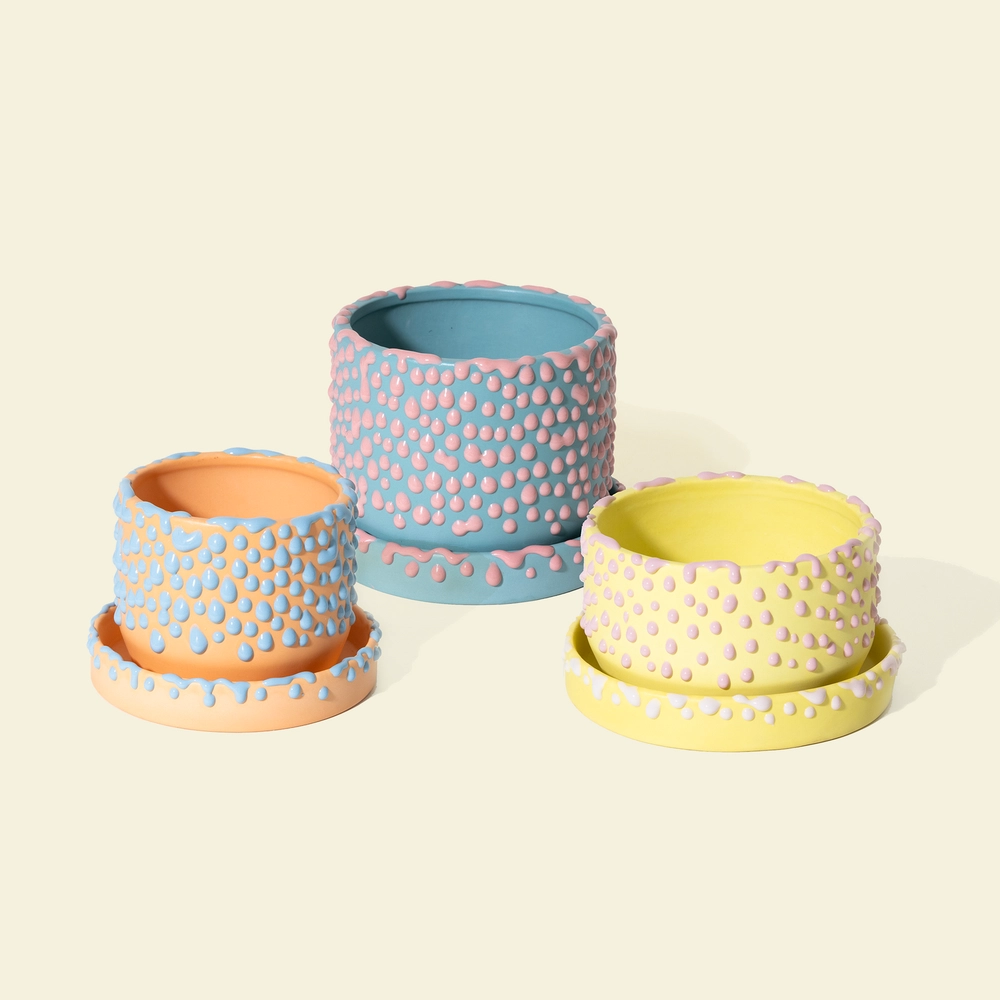 The Gloopy Planter Set: three gloopy planters in peach, blue and yellow