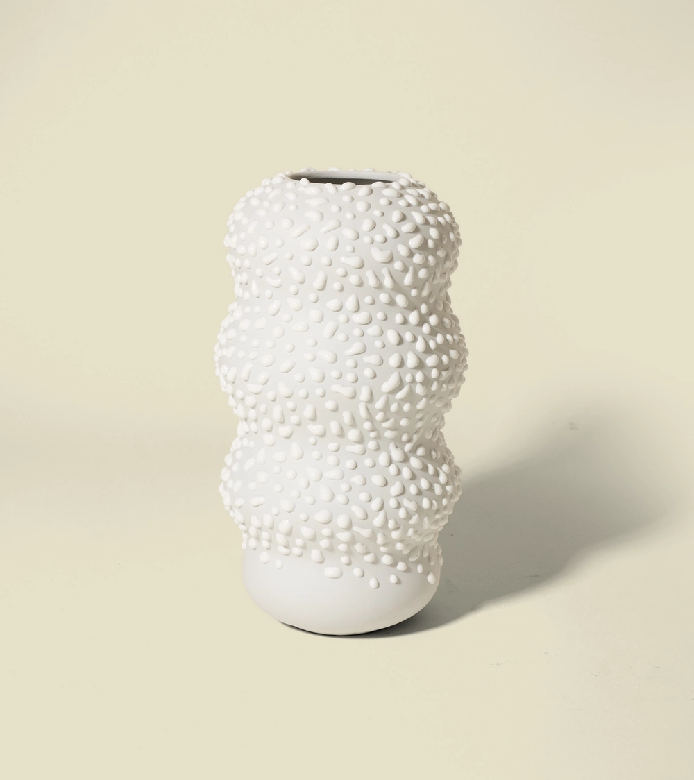 Gloopy Vase by Seth in Cloud: a white vase covered in raised gloops